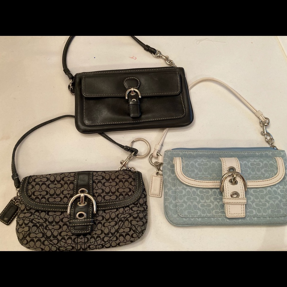 SOLD     Coach Wristlets Outside Pockets Zippered Inside